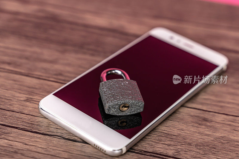 Padlock in front of mobile phone